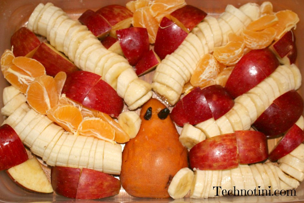 Turkey-shaped Fruit Salads or (Turkey Fruit Platters) are a fun and festive addition to any Thanksgiving party. They’re great for school events and a super kid-friendly Thanksgiving snack. Check out my 5 helpful and funny tips on how to make this so yours does not turn out looking like an Octopus. #Thanksgiving #Thanksgivingfruitplatters #TurkeyFruitPlatters