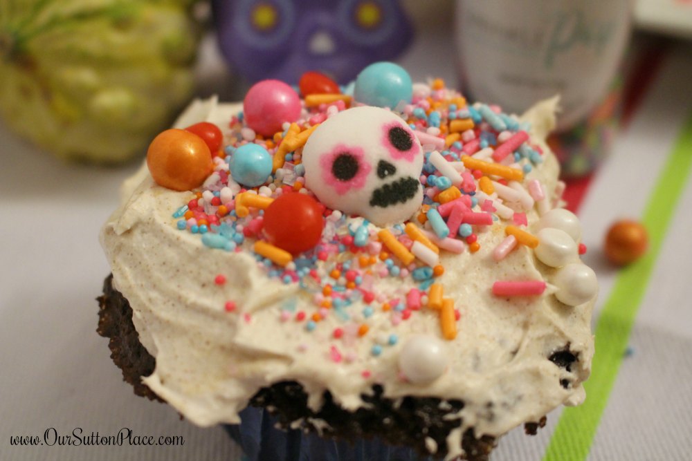 These festive Mexican Hot Chocolate Cupcakes are packed with flavor and perfect for Halloween, Day of the Dead / Dia De Los Muertos, and Disney’s Coco parties. With sugar skulls made from real sugar, these cupcakes are sure to please even the most ghostly of cupcake connoisseurs. #Ad, #Halloween #DisneysCoco #DayoftheDead #cupcakes #mexicanhotchocolate