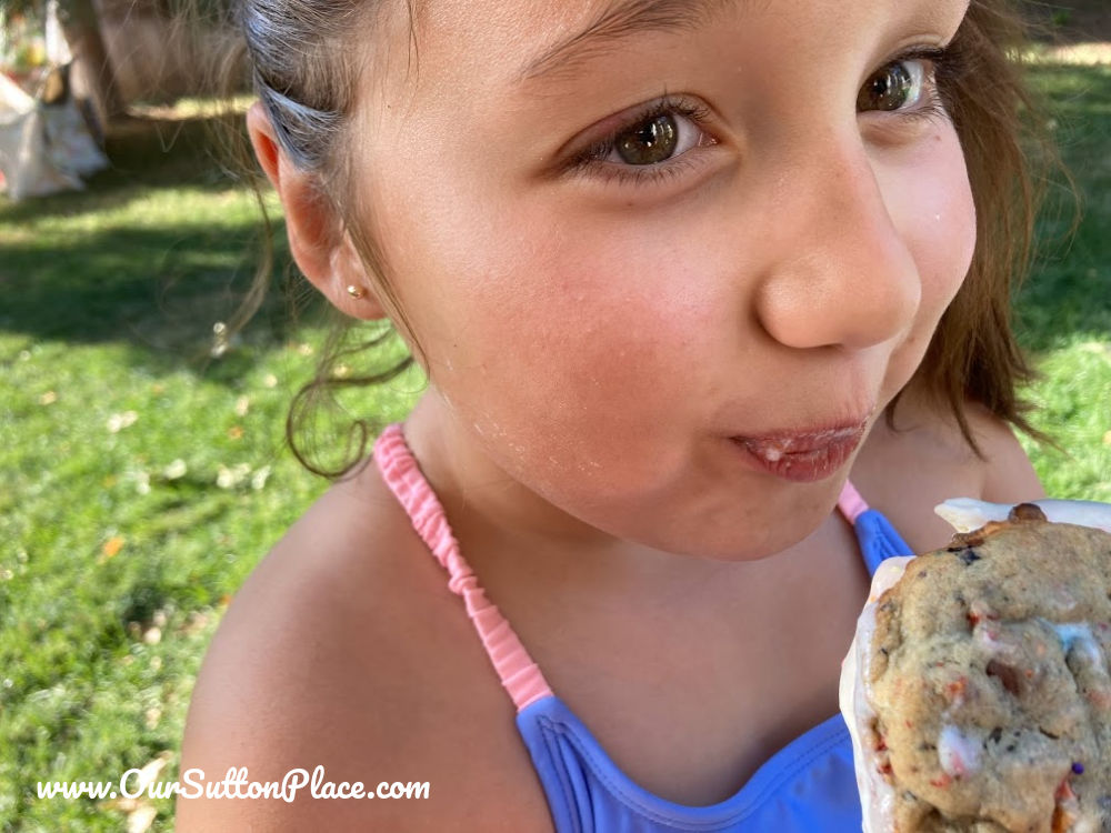 girl eating ice cream sandwich