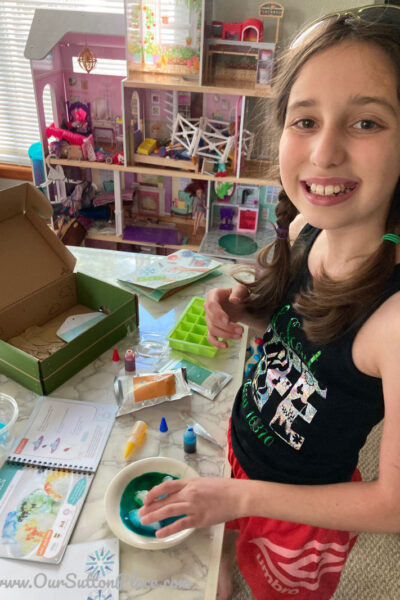 Girl using a KiwiCrate Stem project