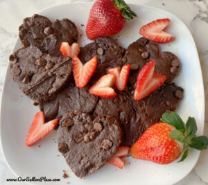 plate of heart shaped vegan brownie cookies